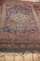Antique Bijar rug lower section: blush, sky blue motifs, prominent foundation wear, tattered fringe.
