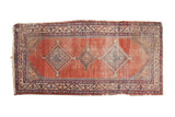 Antique Malayer runner, triple geometric blue medallions on a blush red abrash field, 3'8