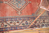 Antique Malayer runner's blue, ivory border, arrowed medallion, abrash, and aged pile.