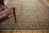 Distressed vintage Turkish Kaisary carpet with faded herati motifs and a classic samovar border.