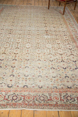 Distressed vintage Turkish Kaisary rug: low pile texture, samovar border, and herati field.
