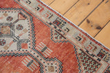 Original side cord selvage detail of the distressed Oushak rug runner with geometric borders.