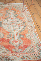 Distressed Oushak runner texture, faded cherry red, sea foam green, ivory, primitive floral border.