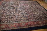 Vintage Persian Bibikabad carpet, a traditional herati motif in rich indigo, raspberry, and ivory.