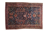 Vintage Persian Lilihan rug with double shadow medallion, navy field, raspberry border, 4'11