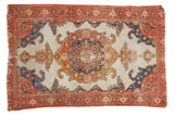 Antique Mission Malayer rug with ivory ground, ornate roundel medallion, red, orange, blue patterns.
