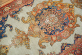Ornate tangerine orange, sky blue, red medallion on antique Malayer ivory ground, worn.