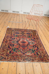 Vintage Fine Malayer rug corner, dusty blush rose field, navy, green motifs, low pile.