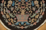 Chinese Art Deco rug detail: hand-knotted tree of life motif in beige, blush, sky blue, fringed edge.