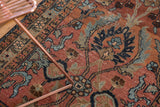 Vintage Heriz runner's hand-knotted pile in dark maroon, navy, and powder blue curvilinear motifs.