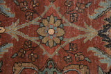 Maroon purple and bronze palmette design detail on a vintage Heriz rug.
