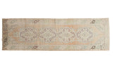 Vintage Distressed Oushak runner with peach and ivory European-style medallions, mint accents, 3x10.
