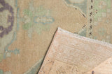 Distressed Oushak runner pile texture, natural fringe, and foundation with painted numbers.