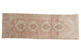 Vintage Distressed Oushak runner with four medallions, blush field, powder blue spandrels.