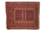 Vintage Turkmen rug, cherry red, paneled design with serrated rams horn and plant motifs, 3'9