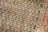 Textured hand-knotted pile of antique Hamadan rug, showing detailed boteh field and border.