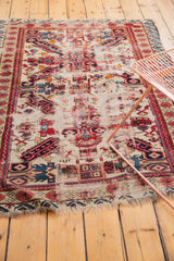 Antique Caucasian Seichor rug detail: reciprocating wave border on rare ivory ground.