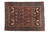 Vintage Hamadan rug with intricate vinery, large serrated leaves, navy, rust, blush tones.