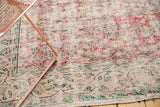 Distressed hand knotted Oushak rug with dusty rose, ivory, mint floral pattern and border fringe.