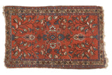 Ornate vintage Lilihan rug featuring oversized floral motifs on a cherry red ground, 2'9