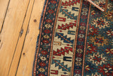 Tattered side selvage and geometric serrated leaf border on an antique Shirvan rug.