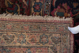 Structured hand-knotted foundation and light ivory fringe of the Vintage Meshed carpet.