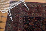 Vintage Meshed carpet featuring navy field, wine red border, delicate floral tendril motifs.