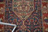 Fine weave antique Senneh rug with intricate Herati motif in navy, red, and ivory.