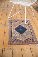 Vintage Senneh rug detail: navy blue Herati motif, knot head wear, side tatter, fringe.