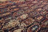 Antique Caucasian rug with playful oversized botehs, staggered and alternating, showing localized wear.