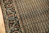 Antique Farahan Sarouk rug's intricate meandering vertical wave motif in ivory and charcoal.