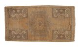 Distressed vintage Oushak rug mat with central roundel medallion in beige and faded green, 1'6