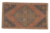 Vintage distressed Turkish Oushak rug with oversized blush medallion, faded blue spandrels, 1'11