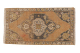 Distressed vintage Oushak rug mat, pale apricot, charcoal medallion, floral vines, 1'7