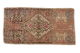 Distressed vintage Oushak rug mat, diamond medallion with germinating plants, dusty mauve, pink accents.