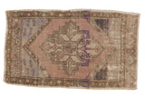 Distressed vintage Oushak rug with faded geometric medallion, mauve, blue, ivory colors, 1'8