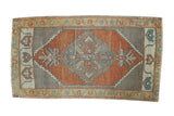 Vintage hand knotted Oushak rug with burnt orange field, grey serrated medallion.