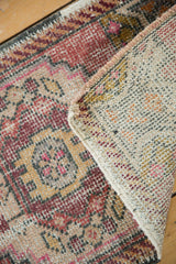 Hand-knotted Vintage Distressed Oushak rug showing blush pile and mostly even wear to foundation.