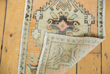 Vintage distressed Oushak rug mat with soft tangerine pile and hand-knotted reverse.