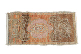 Vintage distressed Oushak rug runner, terracotta and bronze abrashed field, mauve medallion.