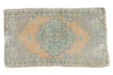 Vintage Distressed Oushak rug with apricot gold medallion and pistachio, slate blue colors.