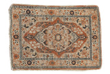 Antique Haji Jalili Tabriz square rug, dusty rust scalloped medallion, intricate floral and vine patterns.