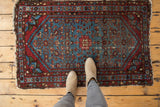Vintage Fine Malayer rug with aqua blue, wine red Herati motif, subtle abrash, and tattered edges.
