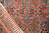 Dark blush, navy, and bronze Sarouk style Lilihan floral pattern on vintage Dargezine rug.
