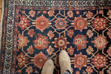 Intricate Veramin floral design with navy blue, madder red, blush, and white knots.