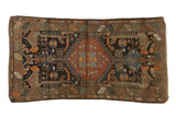 Vintage Kurdish Hamadan rug, oversized serrated medallion, geometric navy, madder red, brown field.