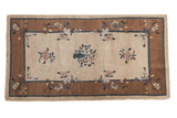Vintage Peking rug runner, natural beige field, ornate central floral vase, bronze and blue accents.