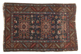 Vintage Persian Heriz rug, navy blue and wine red double medallion, tree-of-life motifs, 2'9