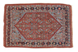 Hand-knotted Antique Bijar rug with a rich cherry brick red herati field and sky blue medallion.