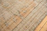 Oushak carpet section with mostly even wear, soft apricot, sandlewood, ivory, and mint green hues.
